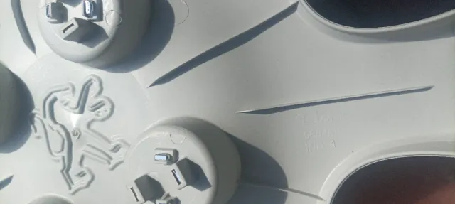 Tapacubos Peugeot parnet (1 unidad)