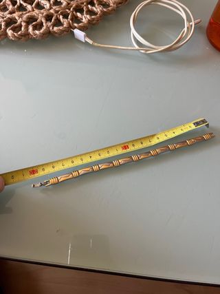 Pulsera de eslabones dorados y plateados