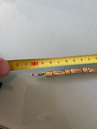 Pulsera de eslabones dorados y plateados