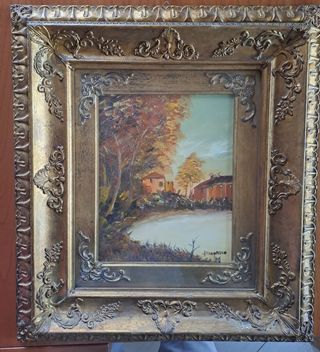 Quadro paesaggistico con cornice dorata