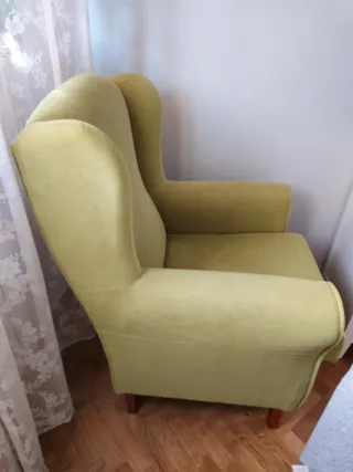 Sillón orejero verde tela