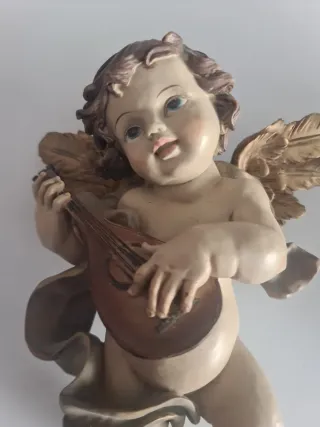 2 Ángeles de cerámica con instrumentos
