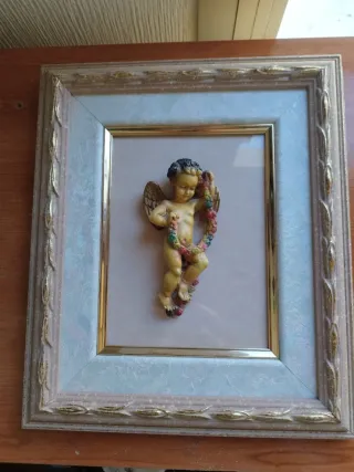 Cuadros querubines en alto relieve. Tallado mano