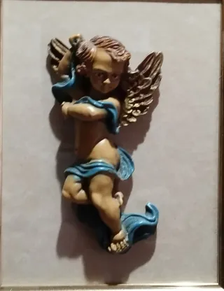 Cuadros querubines en alto relieve. Tallado mano