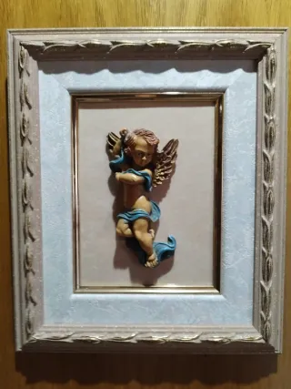 Cuadros querubines en alto relieve. Tallado mano