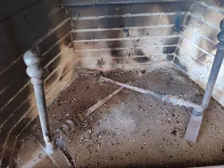 Morillo de chimenea metálico