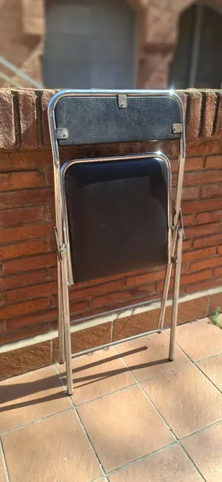 Sillas Plegables Negras y Plateadas