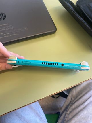Nintendo Switch Lite Turchese con custodia