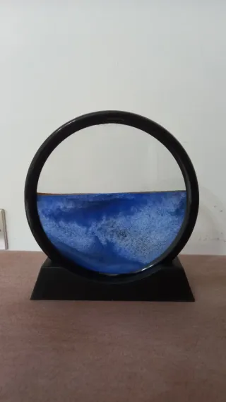 Soprammobile con sabbia colorata