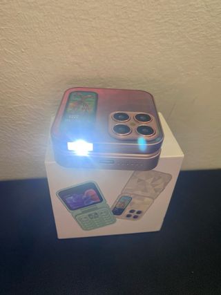 Móvil plegable rosa y verde