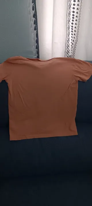 Polo niño naranja talla 146/152, talla en pequeño.