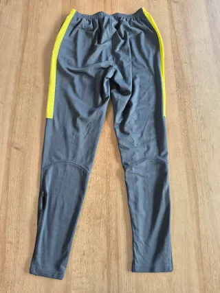 Pantalón chándal Nike gris y verde