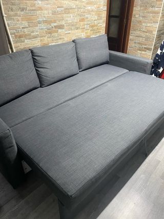 Sofá cama gris de tela
