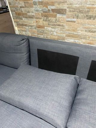 Sofá cama gris de tela