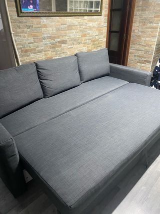 Sofá cama gris de tela