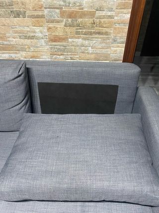 Sofá cama gris de tela