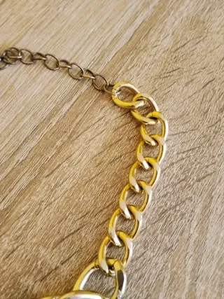 Collar Zara mujer flores negras y doradas