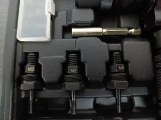 Adaptador para remachadora