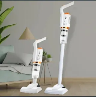 Aspiradora de mano blanca y naranja