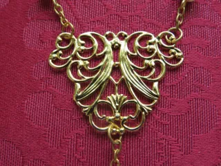 Rosario dorado y perlas