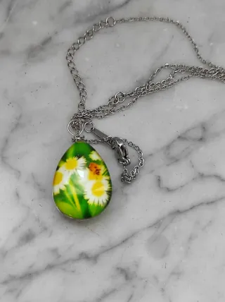Collana acciaio con pendente ovale margherite