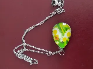 Collana acciaio con pendente ovale margherite