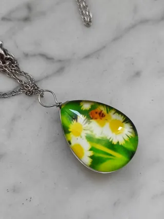 Collana acciaio con pendente ovale margherite