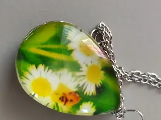 Collana acciaio con pendente ovale margherite