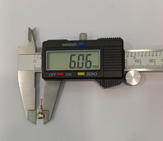 Colgante Oro 18k Bolsa Dinero 0,26gr