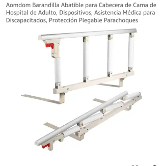 Barandilla abatible para cama.