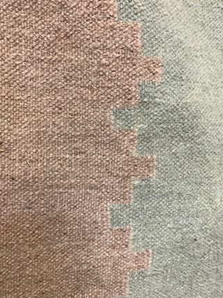 Alfombra decorativa  beige y rosa