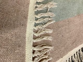 Alfombra decorativa  beige y rosa