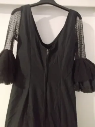 Traje de flamenca negro con volantes