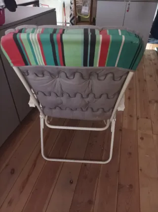 Silla tumbona de tela y metal