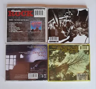 Cds Saxon Massive Attack Mercury rev Cranberries