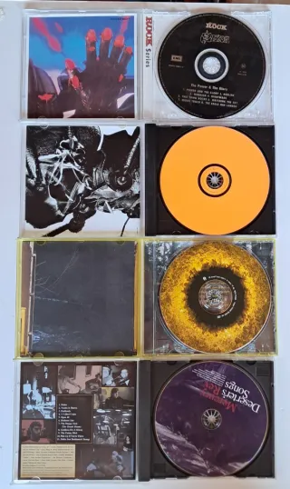 Cds Saxon Massive Attack Mercury rev Cranberries