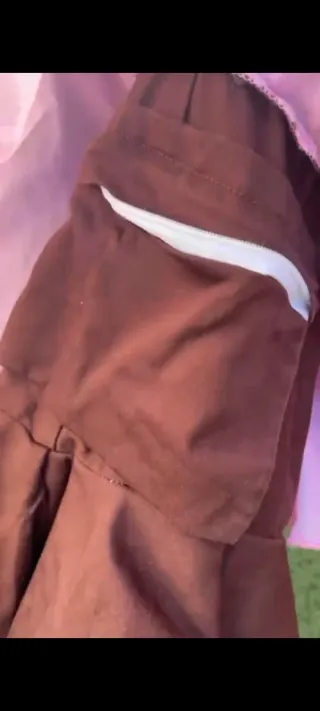 Vestido de flamenca marrón con volantes rosa bebe