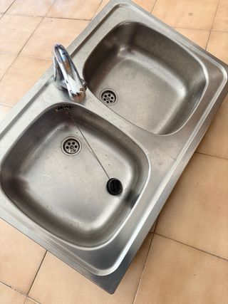 Pica doble de acero inoxidable con grifo