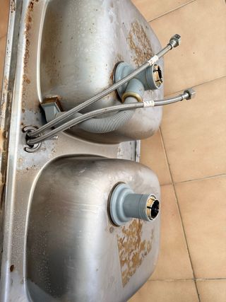 Pica doble de acero inoxidable con grifo