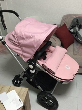 Carrito Bugaboo Gris, con artículos extras en Rosa