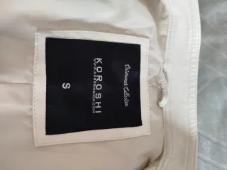 Cazadora efecto piel blanca mujer