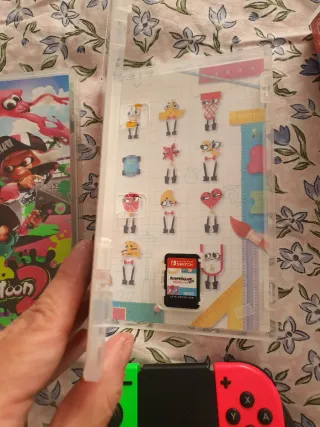 Nintendo Switch Juegos y Joy-Cons y funda