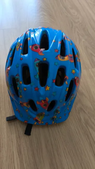 Casco bici infantil azul cohetes