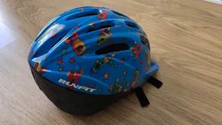Casco bici infantil azul cohetes