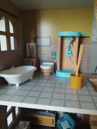 Casa de muñecas de madera