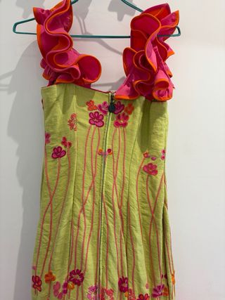 Traje de flamenca verde y naranja