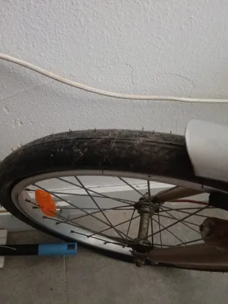 Bicicleta plegable color dorado