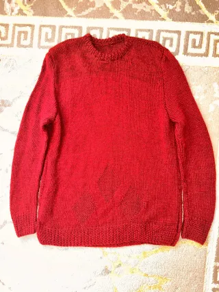 Maglione rosso con rombi