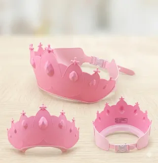 Gorro para el agua con forma de corona rosa