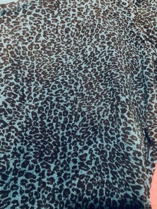 Suéter Animal Print Teal y Negro